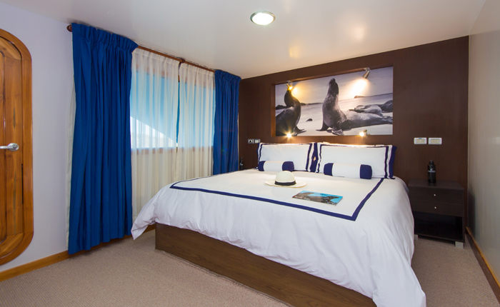 Ocean Spray beautiful stateroom decor aboard the Ultimate Galapagos Luxury Cruise